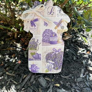 Słoik z decoupage'em i kwiatami