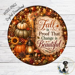 May include: A circular digital design featuring a rustic wooden sign with the text Fall is Proof That Change is Beautiful, surrounded by orange pumpkins, a lit lantern, sunflowers, pinecones, and autumn leaves in shades of gold and brown.