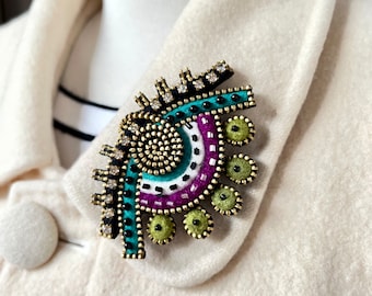 Felt and zipper abstract brooch