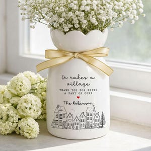 May include: A set of three ceramic nesting bowls in graduating sizes. The bowls feature a speckled, matte finish in shades of cream, light brown, and dark brown. The largest bowl is approximately 7 inches in diameter.