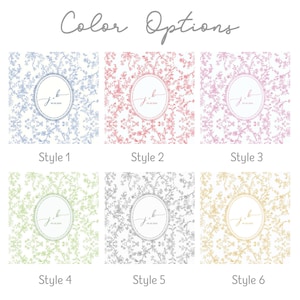 May include: Six color options are displayed, each featuring a floral pattern and a circular monogram. The color choices include blue, red, pink, green, gray, and gold. The text "Color Options" is at the top.