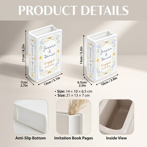 May include: Two white ceramic book-shaped vases with blue and yellow floral designs. The text reads Jessica & Daniel Engaged 08.20.2026. Dimensions are 8.2in x 5.1in x 2.7in and 5.5in x 3.9in x 2.5in. Features include an anti-slip bottom and imitation pages.