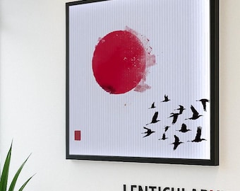 May include: A black framed print with a red circle and black birds flying in a white background. The print is hanging on a white wall with the text "LENTICULARVU" below it.