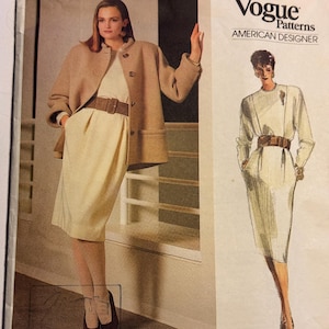 May include: A vintage sewing pattern for a dress with a long skirt and a fitted bodice. The pattern is by Vogue Patterns, American Designer, and is for pattern number 1771. The pattern is for a Geoffrey Beene design.