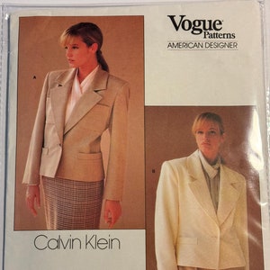 May include: Vogue Patterns American Designer sewing pattern for a blazer by Calvin Klein. The pattern number is 1804.