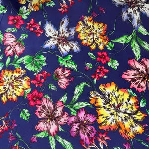 Blue with Brightly Colored Flowers - 16mm Silk Crepe de Chine Fabric