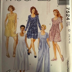 May include: A McCall's sewing pattern envelope featuring illustrations of five different women's garments. The designs include dresses and a jumpsuit. The envelope has the text "Easy McCall's" and "Fashion Basics". The pattern size is D (12, 14, 16).