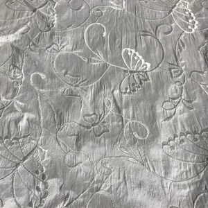 Small Scale Flower Embroidery on White Dupioni Silk