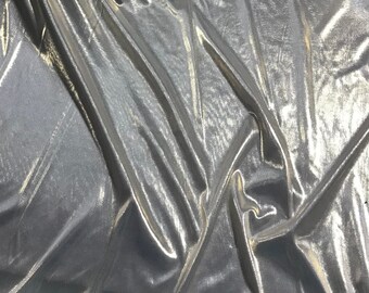 Gold on White Lame Stretch Jersey Fabric