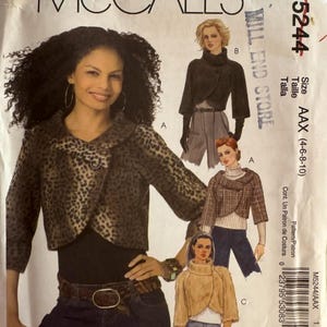 May include: McCall's sewing pattern M5244 for bolero jackets. The pattern features multiple jacket styles, including a leopard print bolero. Size AAX (4-6-8-10). The image includes the text "MILL END STORE".
