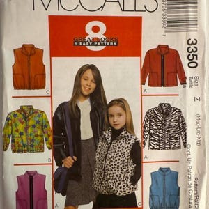 May include: McCall's sewing pattern featuring eight jacket and vest designs. The pattern includes a variety of styles, including a zip-up jacket, a vest with pockets, and a jacket with a colorful floral pattern. The pattern number is 3350.