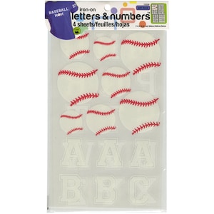 May include: Four sheets of iron-on letters and numbers with a baseball theme. The letters and numbers are white and the baseballs are white with red stitching.