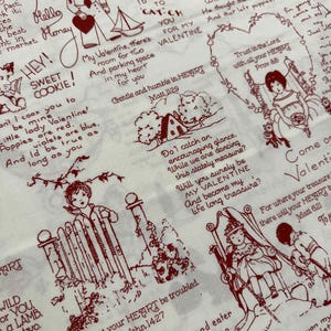 May include: Cream-coloured fabric featuring a repeating pattern of vintage Valentine's Day illustrations in red. The design includes children, hearts, sailboats, and handwritten text with phrases like "Sweet Cookie" and "Be My Valentine."
