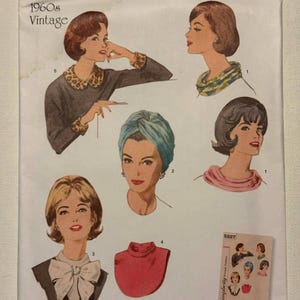 May include: Vintage Simplicity sewing pattern, style 5227, featuring illustrations of women's fashion from the 1960s. The pattern includes various necklines and headwear designs. The package is marked "U.S. ONE SIZE" and "90th Anniversary".