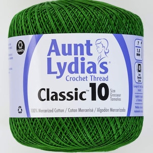 May include: A ball of green Aunt Lydia's Classic 10 crochet thread. The label reads "Aunt Lydia's Crochet Thread" and "Classic 10". It also states that the thread is 100% mercerized cotton.