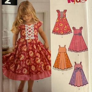 2014 New Look Dresses with Underskirt or Lace up Details. Pattern # A6278 Size: 3-8