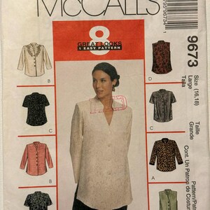 May include: McCall's sewing pattern featuring eight different blouse designs. The pattern includes a variety of styles, from long-sleeved to short-sleeved, with different collar and button details. The cover shows a woman wearing a cream-colored blouse.