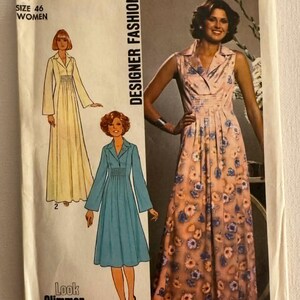 May include: A Simplicity sewing pattern envelope 7822 for a sleeveless floor-length dress with a collared neckline and pleated waist. The cover features illustrations of the dress in yellow and blue, and a photograph of the dress in a floral print.