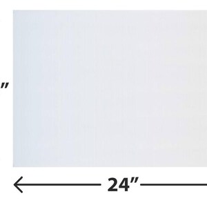 Peut inclure: Une toile blanche mesurant 45,7 cm par 61 cm.