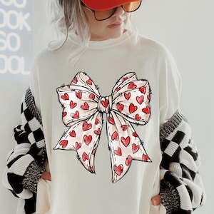 Comfort Colors® Coquette Valentine&#39;s Day Heart Bow Sweatshirt, Retro Valentine Shirt, Valentines day Bow Shirt, Coquette Bow T Shirt