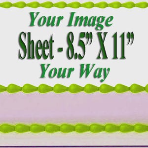 May include: A rectangular cake with a white top, green border, and the text "Your Image Sheet - 8.5" X 11" Your Way" in green. The cake has a light purple layer and a green border.