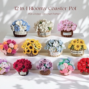 May include: A display of twelve crocheted flower pot coasters in diverse colours, such as blue, white, pink, yellow, and red. Each coaster showcases a unique flower design and is presented on a white tiered surface. The text "12-in-1 Bloomy Coaster Pot" is visible at the top.