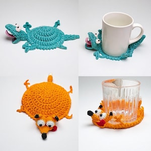 May include: A selection of handmade crochet coasters shaped like cartoon animals. The coasters feature a teal crocodile, an orange fox, and a fox-shaped coaster holding a glass. The crocodile coaster is holding a white mug.