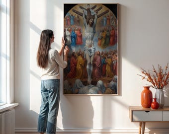 Op de afbeelding: Een schilderij dat een religieuze scène voorstelt met een centrale figuur op een kruis, omringd door andere figuren. Het schilderij is ingelijst in een houten lijst en hangt aan een witte muur.