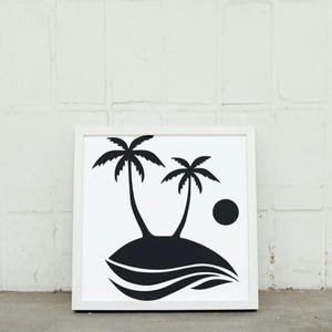 May include: Black and white print of two palm trees on an island with a sun in the background. The print is framed in a white frame.
