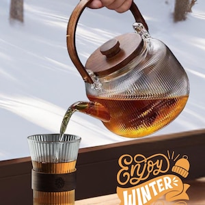 Tetera de cristal soplado a mano apta para cocinas: doble infusor para hojas sueltas y hierbas.