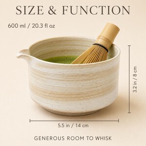 May include: A ceramic matcha bowl with a pour spout and a bamboo whisk. The bowl has a speckled beige and white finish, a 600 ml capacity, and measures 3.2 inches high by 5.5 inches wide. Text reads SIZE & FUNCTION and GENEROUS ROOM TO WHISK.