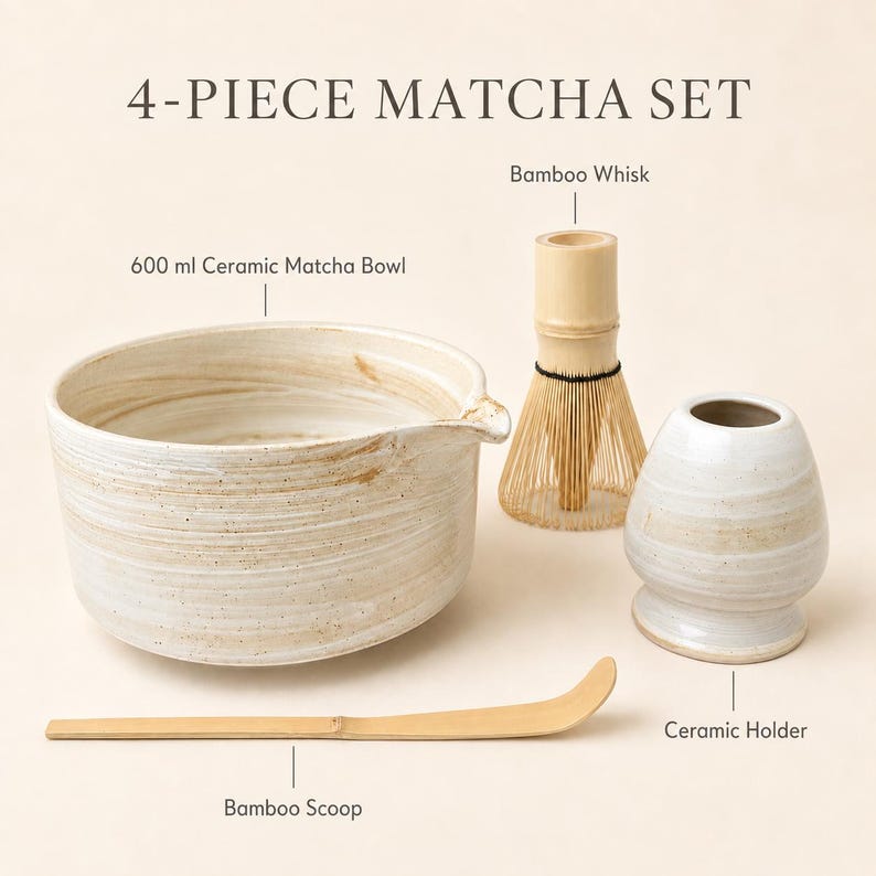 May include: A 4-piece matcha set featuring a 600 ml ceramic matcha bowl with a spout, a bamboo whisk, a bamboo scoop, and a ceramic holder. The items are labeled with text identifying each component of the set against a plain background.