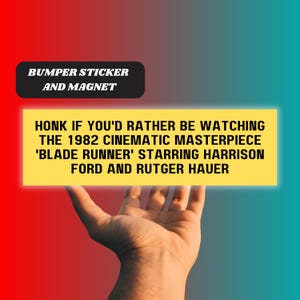 May include: Yellow bumper sticker or magnet with the text "HONK IF YOU'D RATHER BE WATCHING THE 1982 CINEMATIC MASTERPIECE 'BLADE RUNNER' STARRING HARRISON FORD AND RUTGER HAUER"