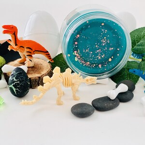 blue sensory play dough from dinosaur themed play kit