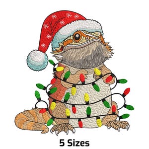 May include: Embroidered design of a bearded dragon wearing a Santa hat and wrapped in Christmas lights. The lizard is in shades of brown, orange, and tan. The Santa hat is red with white trim. The lights are green, red, and yellow. The text "5 Sizes" is at the bottom.