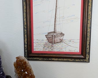 The pen and ink drawing depicted a sailing boat at rest, capturing a serene moment in time.