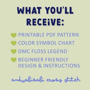 May include: A light green background with navy blue text that reads "WHAT YOU'LL RECEIVE:" followed by a list of items including a printable PDF pattern and a color symbol chart. The text "andwabisabi cross stitch" is at the bottom.