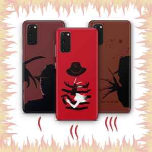 May include: Three phone cases with different designs featuring the character Freddy Krueger from the movie A Nightmare on Elm Street. The cases are red, brown, and black. The text on the brown case reads: "Get me... Please, don't let him... Don't you... Why did you... Why?"