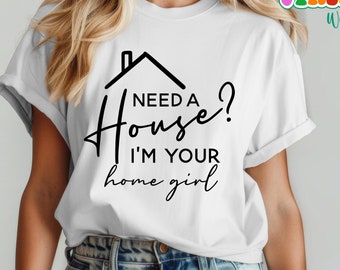 May include: White t-shirt with black text that reads "Need a House? I'm your home girl" and a small house graphic above the text.