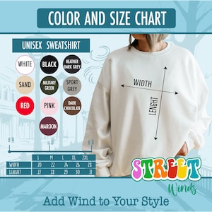 a woman wearing a white sweatshirt with the words, color and size chart