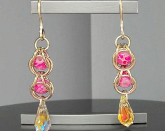 Weaved earrings with crystal teardrops