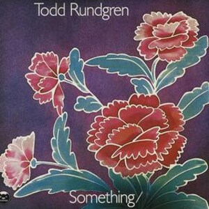 May include: A white ceramic mug with a black handle and the text "But First, Coffee" in a handwritten style. The mug is on a white surface. The mug is approximately 4 inches tall.