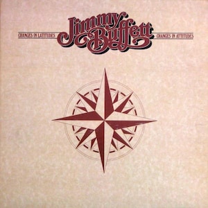 Pode incluir: Capa do álbum com o nome "Jimmy Buffett" em uma fonte bordô estilizada acima de uma rosa dos ventos bordô e branca. O texto "Changes in Latitudes" e "Changes in Attitudes" é impresso em bordô.