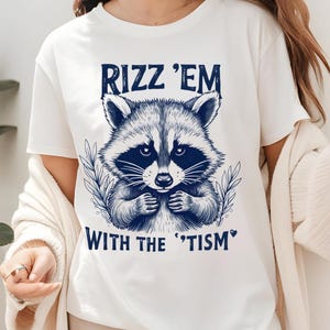 Rizz &#39;Em With The &#39;Tism Shirt, Funny Raccoon T-Shirt, Vintage Autism Awareness Tee, Retro Meme Shirt, Unisex Graphic Gift for Raccoon Lovers