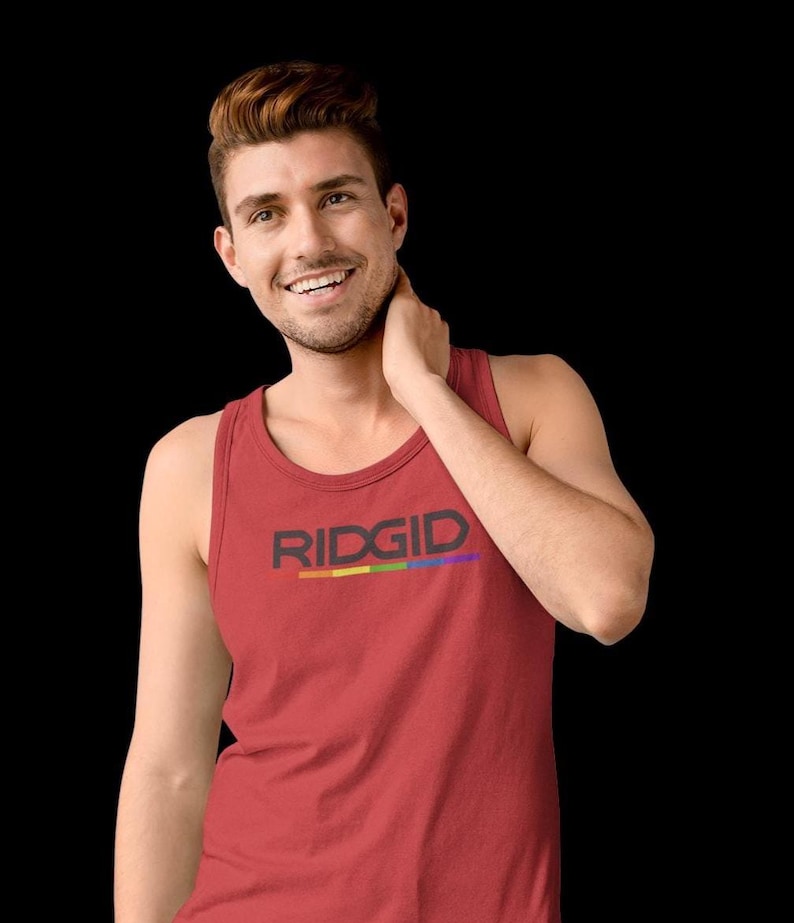 May include: A red tank top with the word "RIDGID" in black block letters and a rainbow stripe underneath. The tank top is sleeveless and made of a soft material.