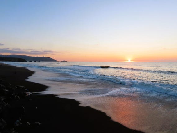 Coastal Dusk in Northern California as the sun gently meets the horizon