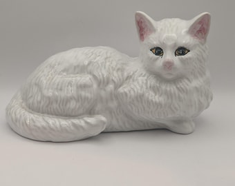 Bordallo Pinheiro laying down cat figurine. Portugal