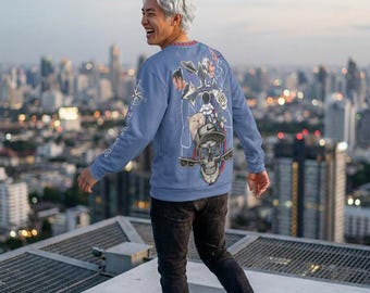 Follow Your Dreams airplane sweatshirt | illustrated skull, astronaut, collage design