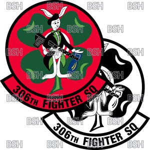May include: A red and white circular patch with a green shamrock and a cartoon rabbit holding a machine gun. The text "306th Fighter SQ" is written around the edge of the patch.