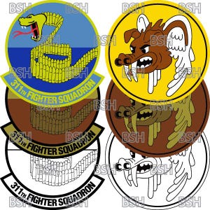 May include: Four round patches with different designs. The top left patch is blue with a yellow snake and the text "311th Fighter Squadron". The top right patch is yellow with a brown winged creature and the text "311th Fighter Squadron". The bottom left patch is brown with a white snake and the text "311th Fighter Squadron". The bottom right patch is white with a black winged creature and the text "311th Fighter Squadron".
